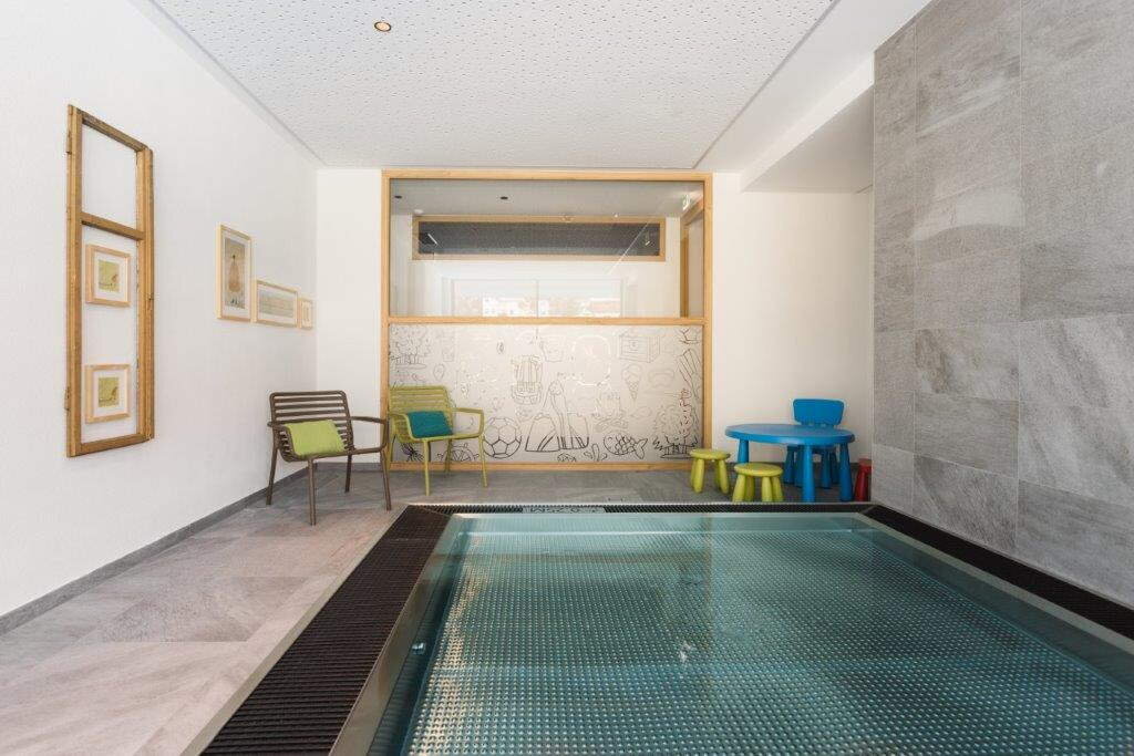 Indoor-Pool von Aparthotel alpina & more
